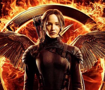 Warrior woman with wings and bow, standing in front of a fiery background featuring a circular emblem with flames.